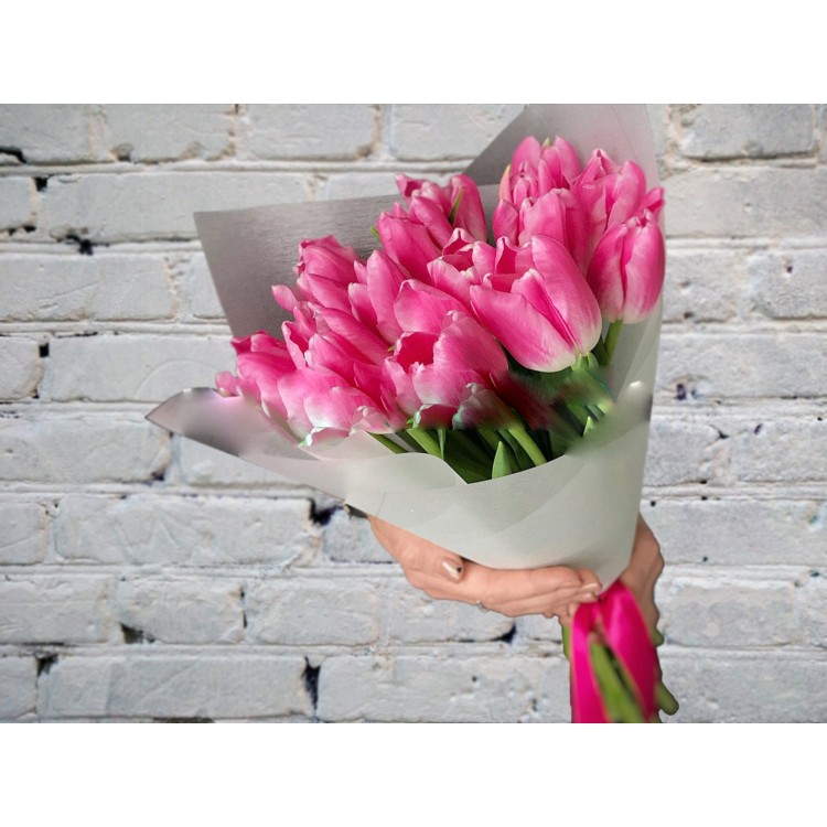 Sale Bouquet of Bright Pink Tulips in a Light Package
