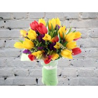 Bouquet of yellow and red tulips with ribbon
