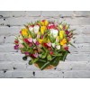 Basket of yellow and pink tulips
