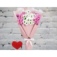 Bouquet of Chamomile Chrysanthemums in a package
