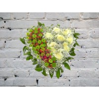 Composition of hypericum and chrysanthemum in the shape of a heart
