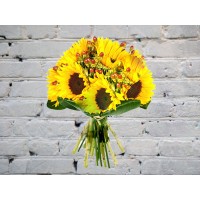 Bouquet with sunflowers and hypericum
