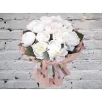 A bouquet of White Peonies in a Craft package
