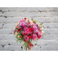 A bright bouquet with a Red Bush rose and Lisianthus (Eustoma)
